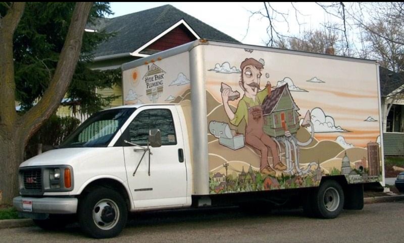 Hyde Park Plumbing service van with custom art wrap